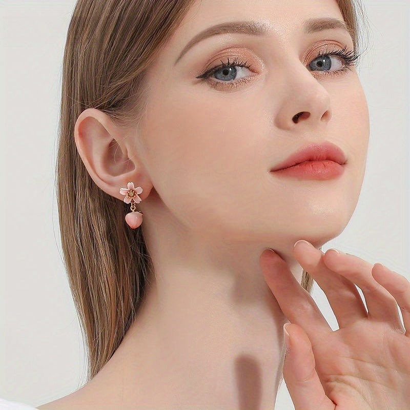 1 pair of sweet and cute peach shaped earrings designed for autumn and winter, perfect for girls as holiday and New Year gifts