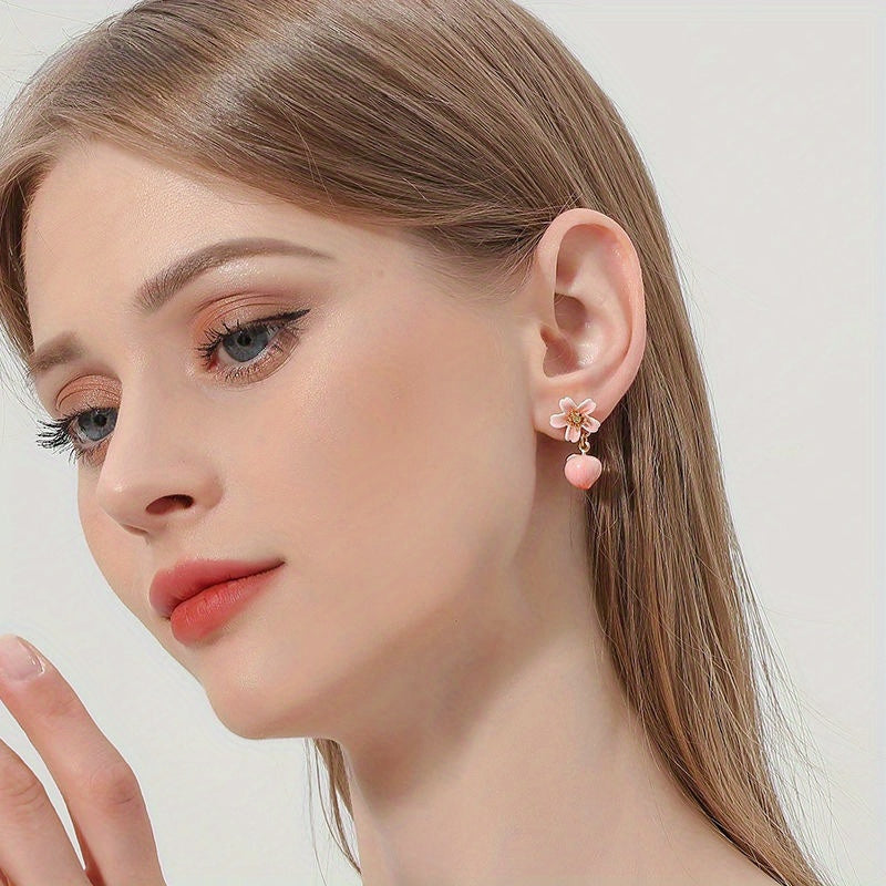 1 pair of sweet and cute peach shaped earrings designed for autumn and winter, perfect for girls as holiday and New Year gifts
