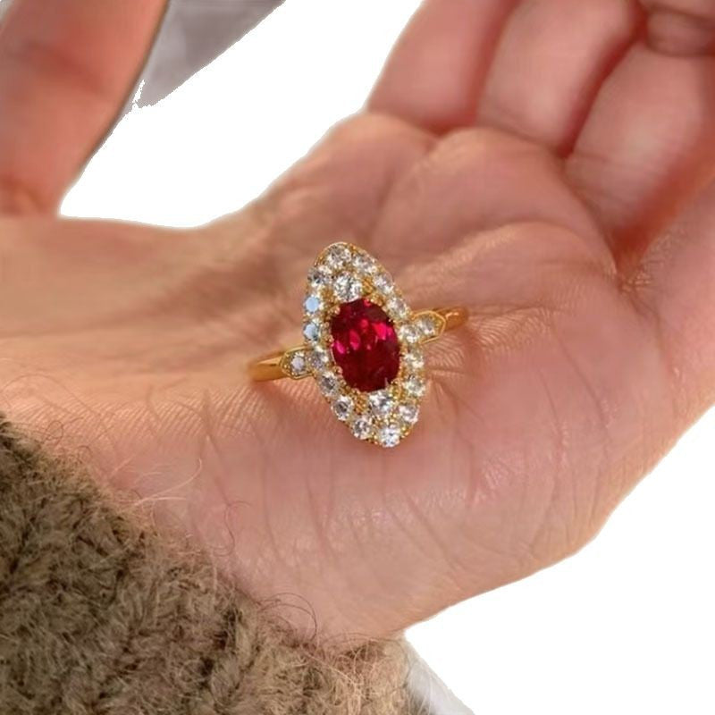 Vintage European and American S925 silver light luxury retro exquisite court style inlaid with 6 * 8mm oval red small clear marriage proposal ring, banquet, party, birthday gift lady